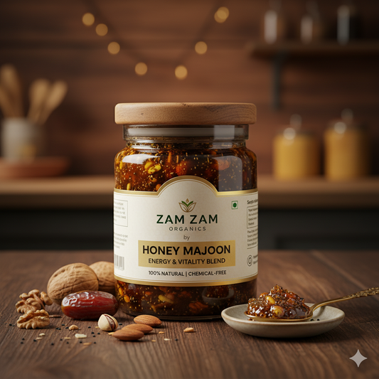 Jar of Zam Zam Honey Majoon on a wooden table with ingredients and a spoonful of honey.